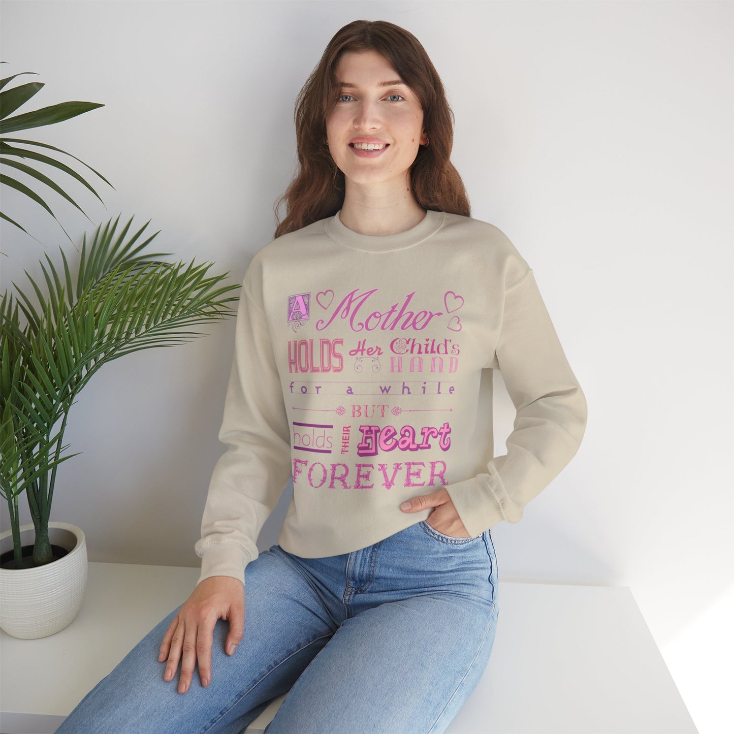A Mother Holds - Mother's Day Sweatshirt by TOOLOUD