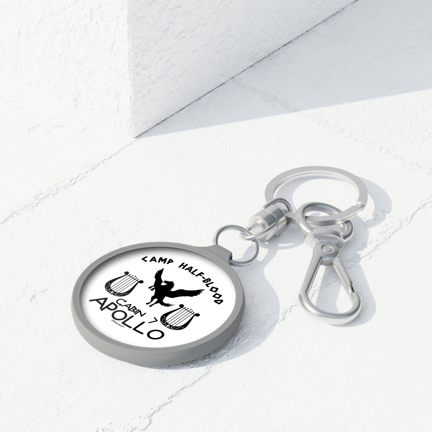 Cabin 7 Apollo Camp Half-Blood Round Keyring Tag by TOOLOUD